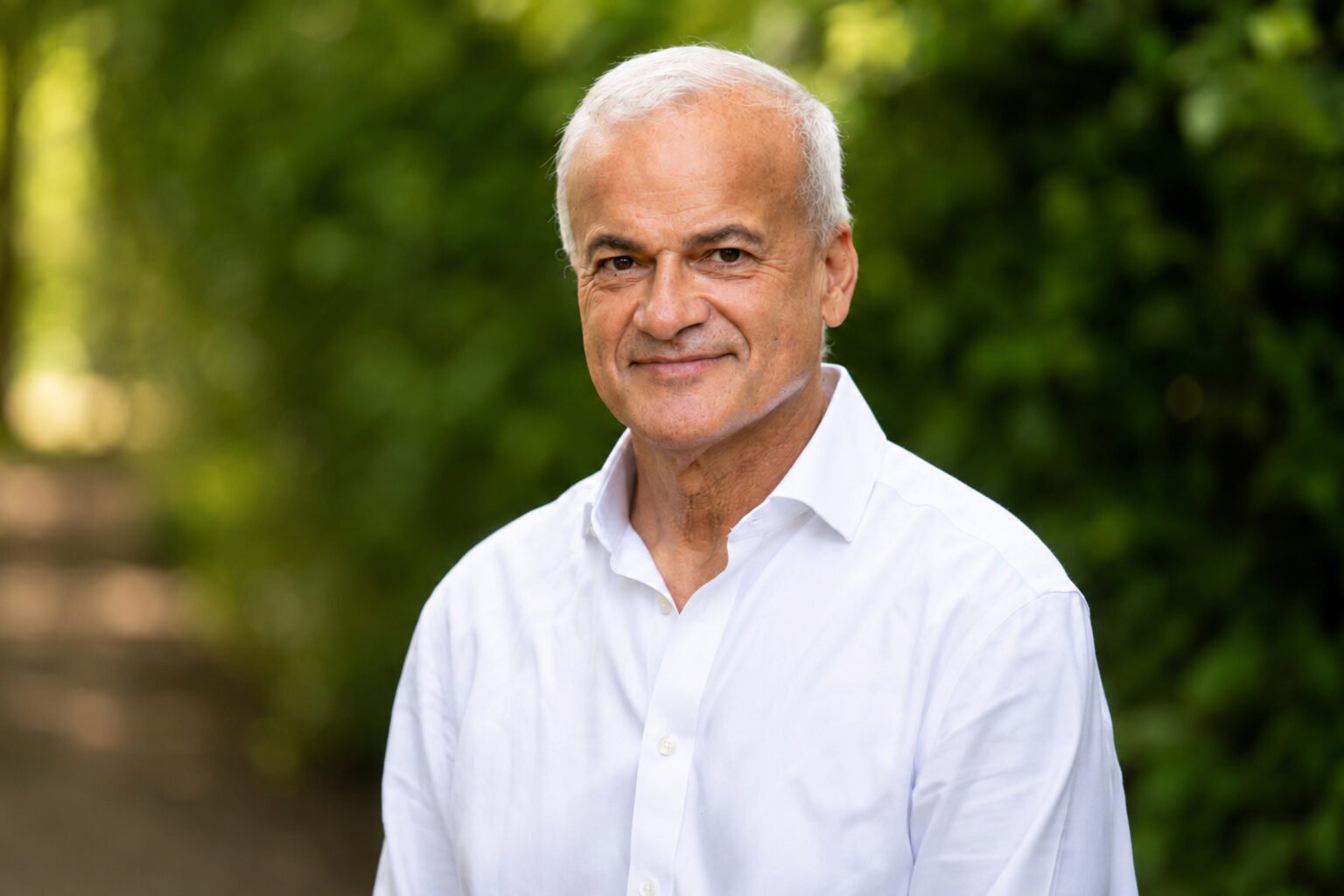 David de Jager, founder of OTE, photographed outdoors wearing a white shirt.